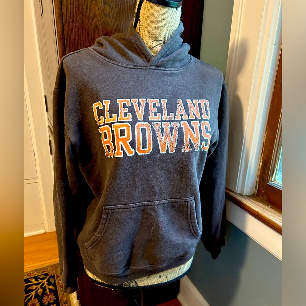 Cleveland Browns brown sweatshirt.